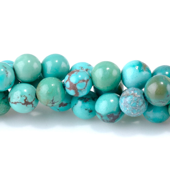This is a Dakota Stones 5mm Hubei Turquoise Matrix Gemstone strand with round beads in 15-16 inch strand.