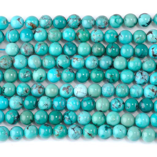 This is a Dakota Stones 6mm Hubei Turquoise Matrix Gemstone strand with round beads in 15-16 inch strand.
