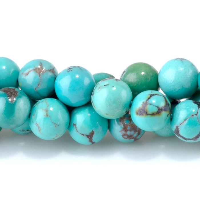 This is a Dakota Stones 6mm Hubei Turquoise Matrix Gemstone strand with round beads in 15-16 inch strand.