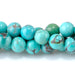 This is a Dakota Stones 6mm Hubei Turquoise Matrix Gemstone strand with round beads in 15-16 inch strand.