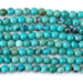 This is a Dakota Stones 6-7mm Hubei Turquoise Matrix Gemstone strand with round beads in 15-16 inch strand.