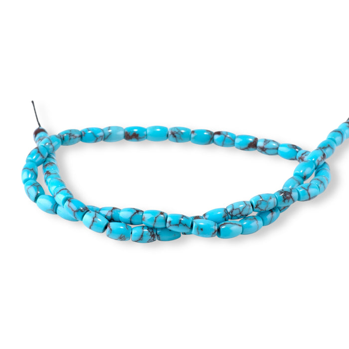 This is a Dakota Stones 5x7mm Egyptian Turquoise Gemstone strand with barrel beads in 15-16 inch strand.