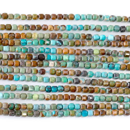 This is a Dakota Stones 3mm Hubei Turquoise Banded Gemstone strand with table-cut cube beads in 15-16 inch strand.