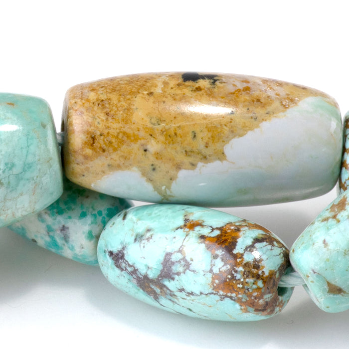 Hubei Turquoise 7-11x14-25mm Light Blue Graduated Rice Beads - 15-16 Inch