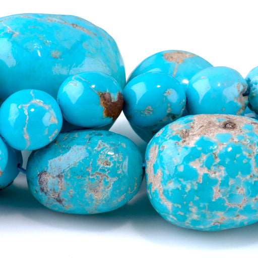 This is a Dakota Stones 10-16x20mm Sleeping Beauty Turquoise Gemstone strand with nugget beads in 15-16 inch strand.