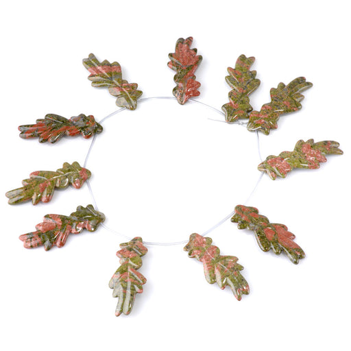 This is a Dakota Stones 24x60mm Unakite Leaf Gemstone strand of round beads in 15-16 inch strand.