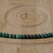 This is a Dakota Stones 8mm Verdite Large Hole Gemstone strand with faceted rondelle beads in 8 inch strand.