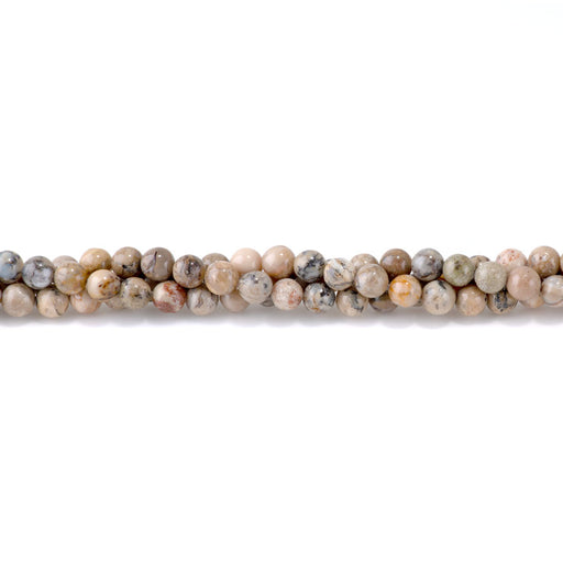 This is a Dakota Stones 6mm White African Opal Red Matrix Gemstone strand with round beads in 15-16 inch strand.