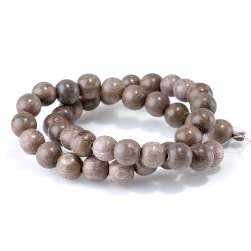 This is a Dakota Stones 10mm Gray Wood Gemstone strand with round beads in 15-16 inch strand.