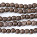 This is a Dakota Stones 10mm Gray Wood Gemstone strand with round beads in 15-16 inch strand.