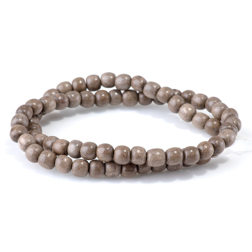 This is a Dakota Stones 6mm Gray Wood Gemstone strand with round beads in 15-16 inch strand.
