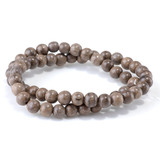 This is a Dakota Stones 8mm Gray Wood Gemstone strand with round beads in 15-16 inch strand.