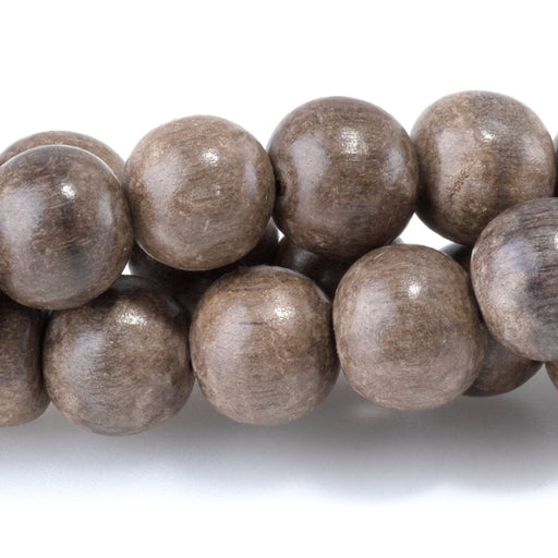 This is a Dakota Stones 8mm Gray Wood Gemstone strand with round beads in 15-16 inch strand.