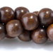 This is a Dakota Stones 10mm Madre de Cacao Gemstone strand with round beads in 15-16 inch strand.