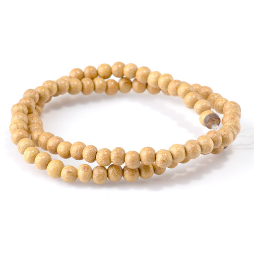 This is a Dakota Stones 6mm Nangka Gemstone strand with round beads in 15-16 inch strand.