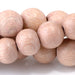This is a Dakota Stones 10mm Rose Wood Gemstone strand with round beads in 15-16 inch strand.