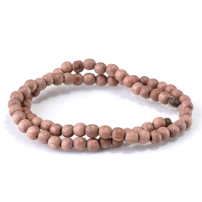 This is a Dakota Stones 6mm Rose Wood Gemstone strand with round beads in 15-16 inch strand.