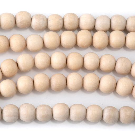 This is a Dakota Stones 10mm White Wood Gemstone strand with round beads in 15-16 inch strand.