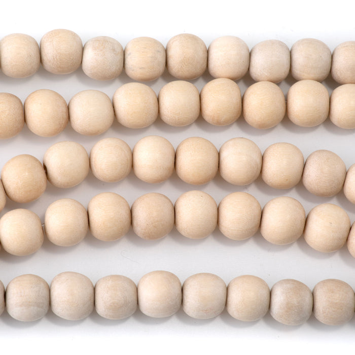 This is a Dakota Stones 10mm White Wood Gemstone strand with round beads in 15-16 inch strand.