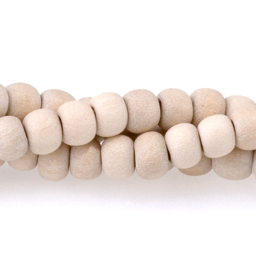 This is a Dakota Stones 4mm White Wood Gemstone strand with natural round beads in 15-16 inch strand.