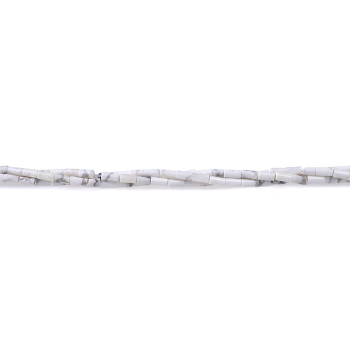 This is a Dakota Stones 2x4mm White Howlite Tube Gemstone strand of round beads in 15-16 inch strand.