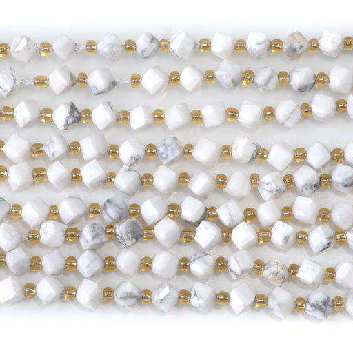 This is a Dakota Stones 4x6mm White Howlite Corner Gemstone strand with table-cut cube beads in 15-16 inch strand.