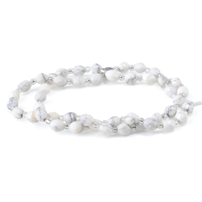 White Howlite 4x6mm Faceted Triangle Cut Rice - 15-16 Inch