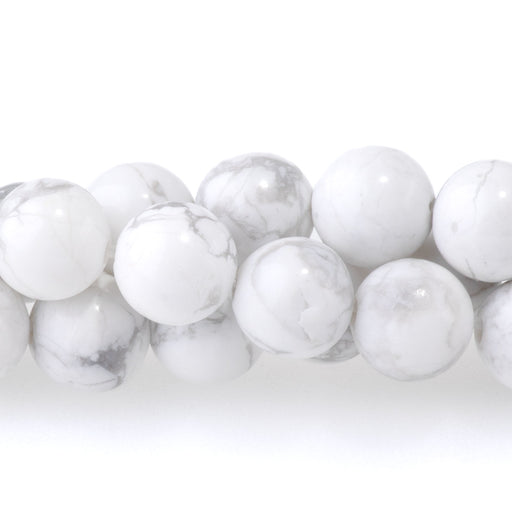 This is a Dakota Stones 6mm White Howlite Gemstone strand with round beads in 15-16 inch strand.