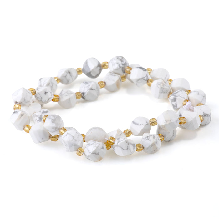 White Howlite 7x8mm Faceted Swirl Oval - 15-16 Inch