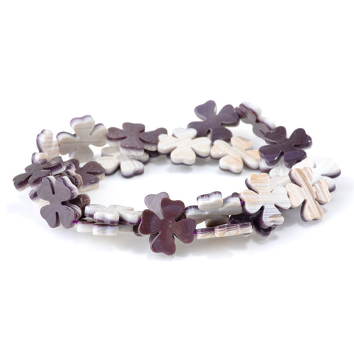 This is a Dakota Stones 15mm Wampum Shell Clover Gemstone strand of round beads in 15-16 inch strand.