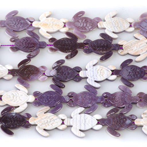 This is a Dakota Stones 16x20mm Wampum Shell Carved Turtle Gemstone strand of round beads in 15-16 inch strand.