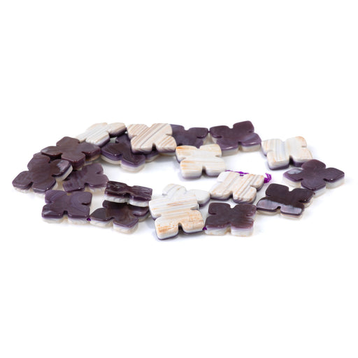 This is a Dakota Stones 20mm Wampum Shell Gemstone strand with cross beads in 15-16 inch strand.