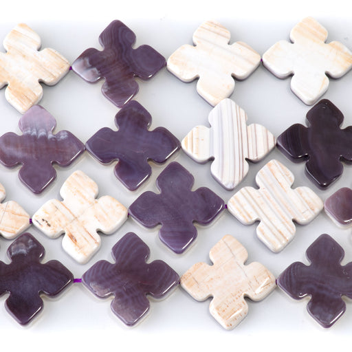 This is a Dakota Stones 20mm Wampum Shell Gemstone strand with cross beads in 15-16 inch strand.