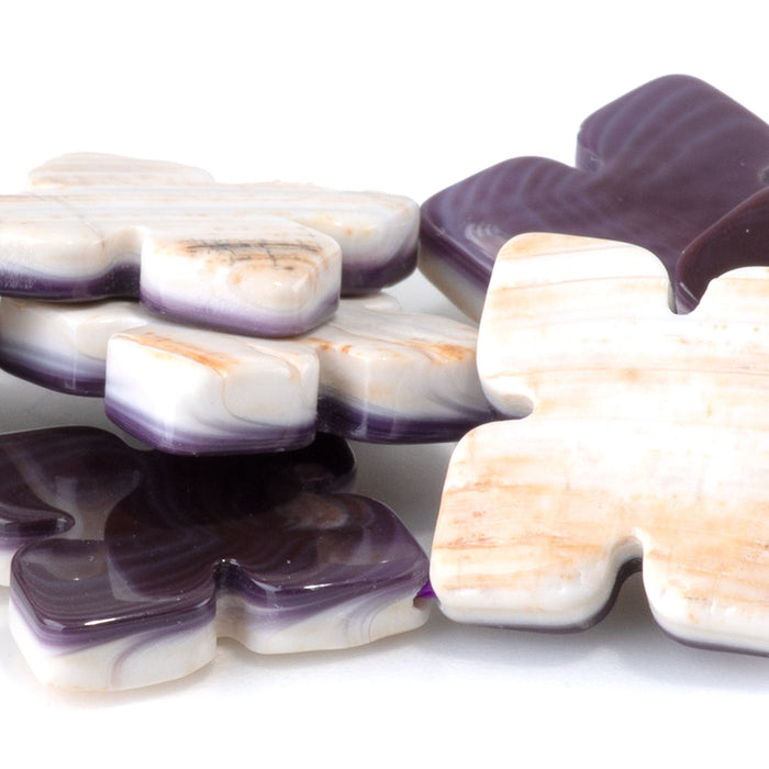 This is a Dakota Stones 20mm Wampum Shell Gemstone strand with cross beads in 15-16 inch strand.