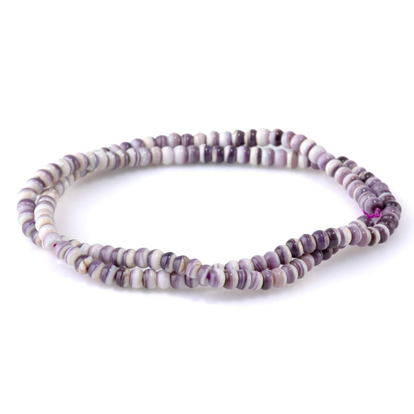 This is a Dakota Stones 4mm Wampum Shell Gemstone strand with rondelle beads in 15-16 inch strand.