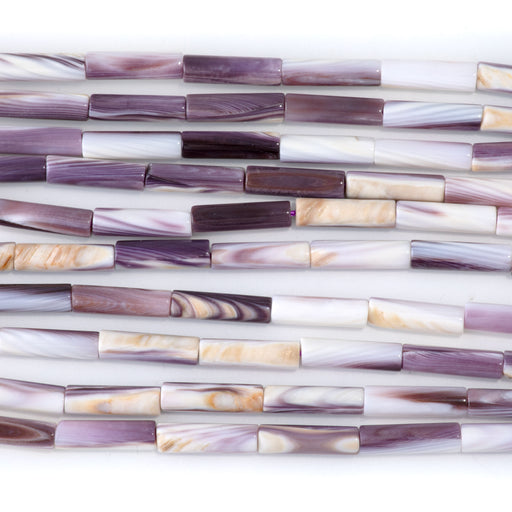 This is a Dakota Stones 4x14mm Wampum Shell Tube Gemstone strand of round beads in 15-16 inch strand.