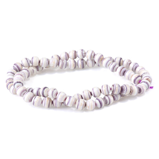 This is a Dakota Stones 6mm Wampum Shell Gemstone strand with round beads in 15-16 inch strand.