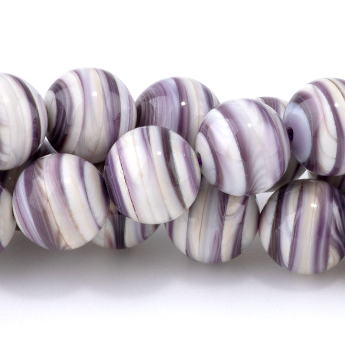This is a Dakota Stones 8mm Purple Shell Gemstone strand with round beads in 15-16 inch strand.