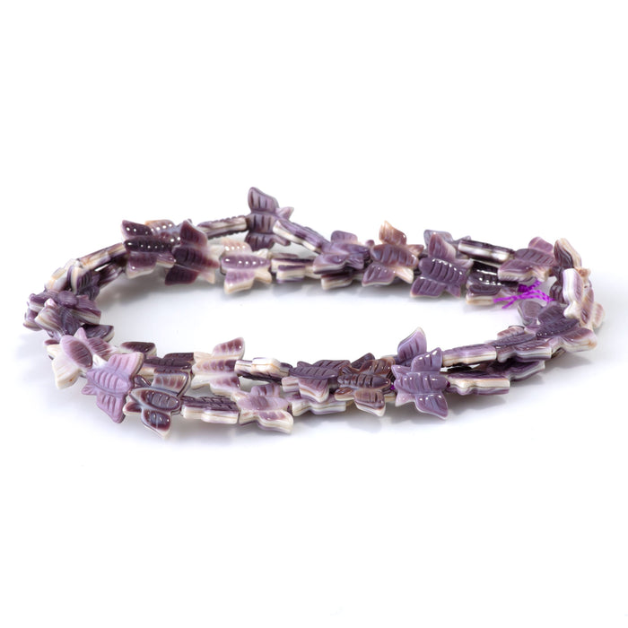 This is a Dakota Stones 8x11mm Wampum Shell Carved Butterfly Gemstone strand of round beads in 15-16 inch strand.
