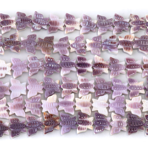 This is a Dakota Stones 8x11mm Wampum Shell Carved Butterfly Gemstone strand of round beads in 15-16 inch strand.
