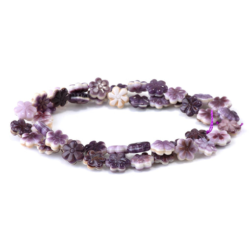 This is a Dakota Stones 9mm Wampum Shell Carved Flower Gemstone strand of round beads in 15-16 inch strand.
