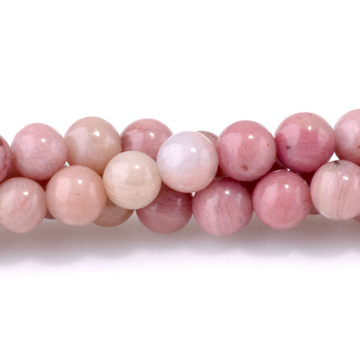 This is a Dakota Stones 4mm Wood Rhodonite Gemstone strand with round beads in 15-16 inch strand.
