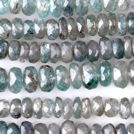 This is a Dakota Stones 3x4-4x7mm Blue Zircon Necklace Gemstone strand with faceted rondelle beads in 15-16 inch strand.