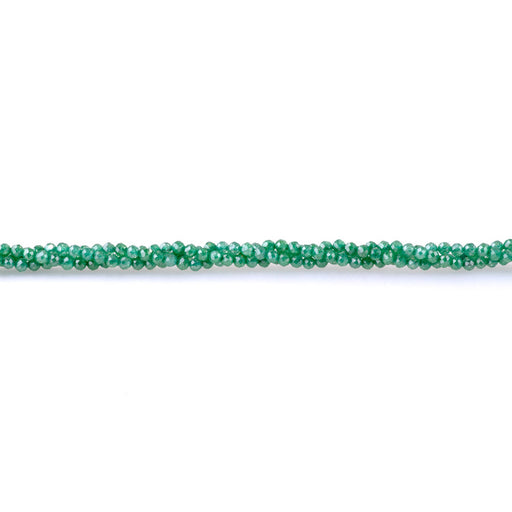 This is a Dakota Stones 3mm Zirconia Emerald Green Synthetic Gemstone strand with faceted round beads in 15-16 inch strand.