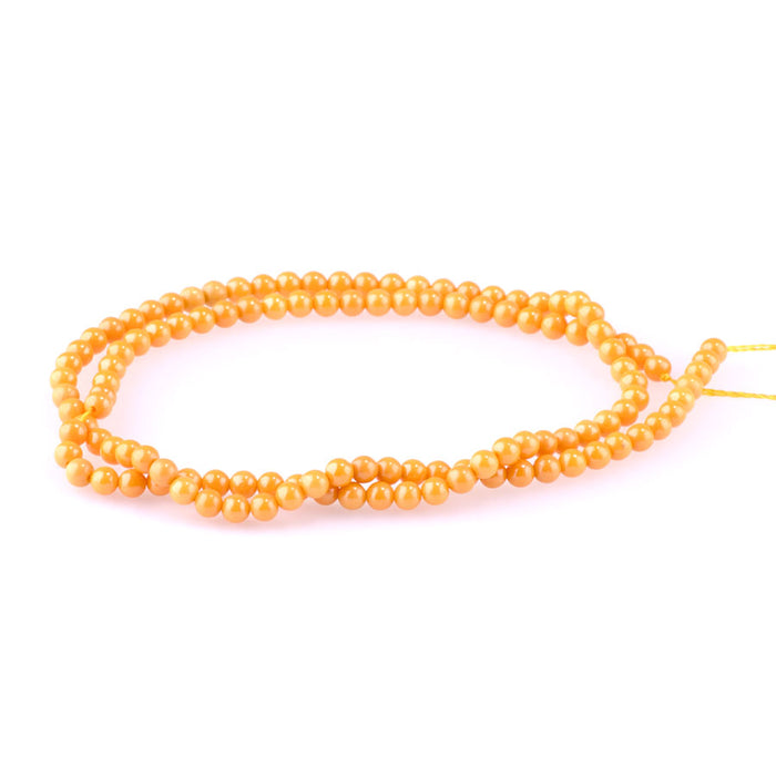 Zirconia 3mm Round Light Orange Pearl (Synthetic) - 14.5-15 Inch