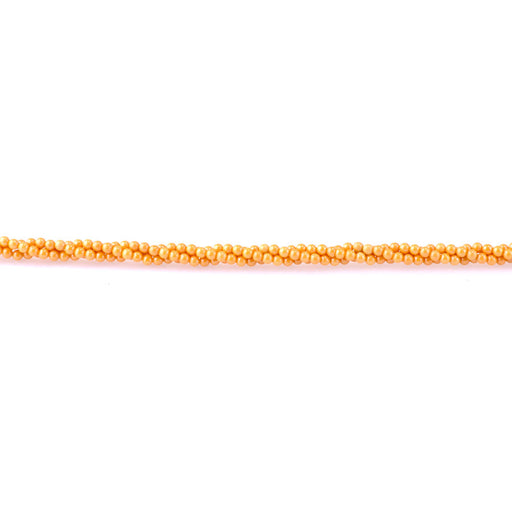 This is a Dakota Stones 3mm Zirconia Light Orange Pearl Synthetic Gemstone strand with faceted round beads in 5-15 inch strand.