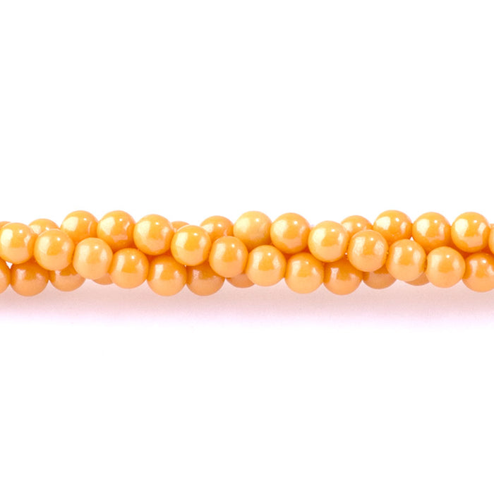 Zirconia 3mm Round Light Orange Pearl (Synthetic) - 14.5-15 Inch