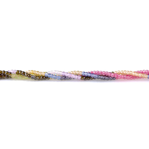 This is a Dakota Stones 2x3mm Zirconia Color Banded Gemstone strand with faceted rondelle beads in 15-16 inch strand.