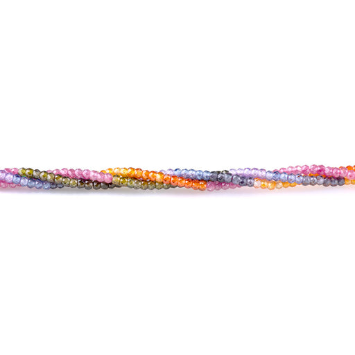 This is a Dakota Stones 2x3mm Zirconia Color Banded Gemstone strand with faceted rondelle beads in 15-16 inch strand.