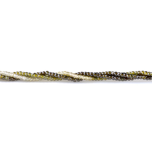 This is a Dakota Stones 2x3mm Zirconia Green Banded Gemstone strand with faceted rondelle beads in 15-16 inch strand.